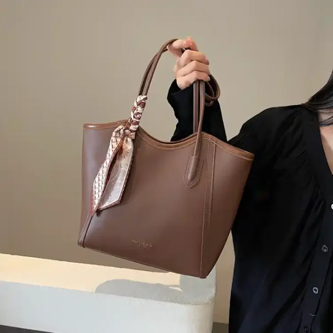 Elegant Brown Tote Bag with Leather Trim and Scarf Accent