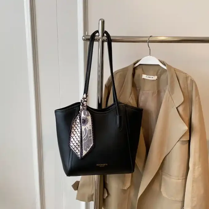 Elegant Black Tote Bag with Leather Trim and Scarf Accent