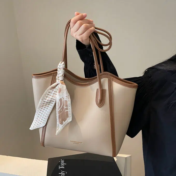 Elegant Beige Tote Bag with Leather Trim and Scarf Accent